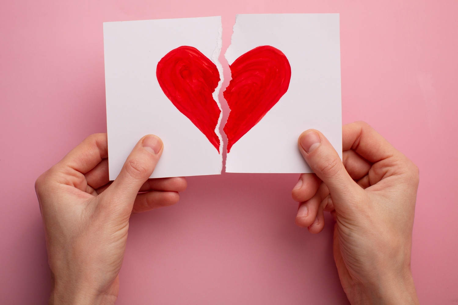 resilience in love coping with change and separation dr krishna athal torn heart on pink background symbolising broken relationships dr krishna athal