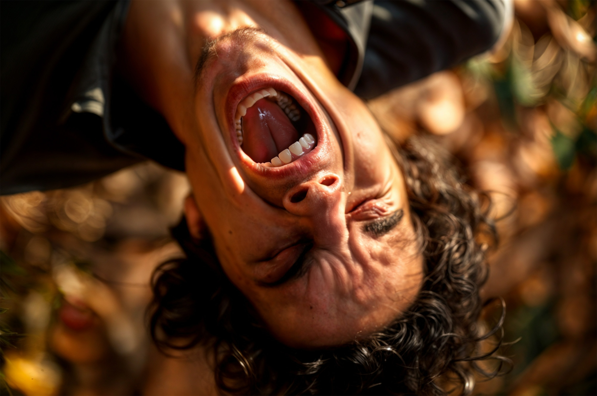 close up of a person screaming outdoors upside down capturing the intensity of rage after resilience and emotional overload   dr krishna athal